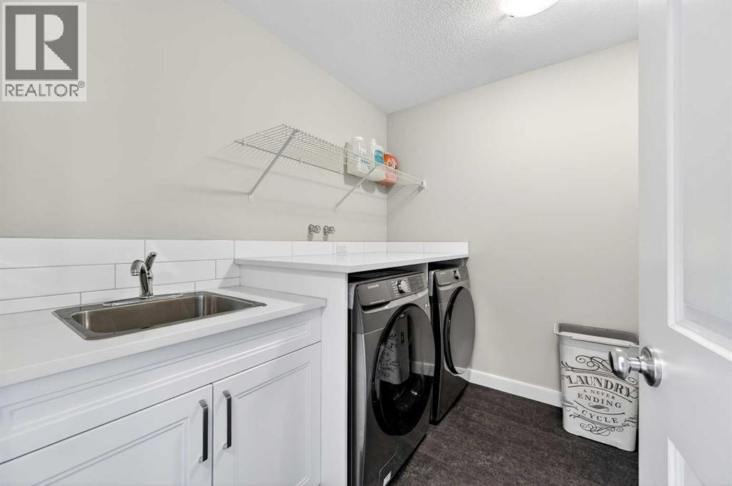 77 Belvedere Drive Se, Calgary, AB - Indoor Photo Showing Laundry Room