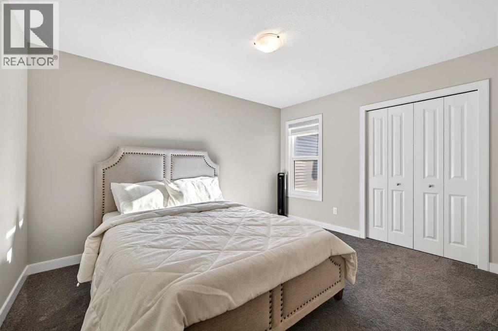 77 Belvedere Drive Se, Calgary, AB - Indoor Photo Showing Bedroom