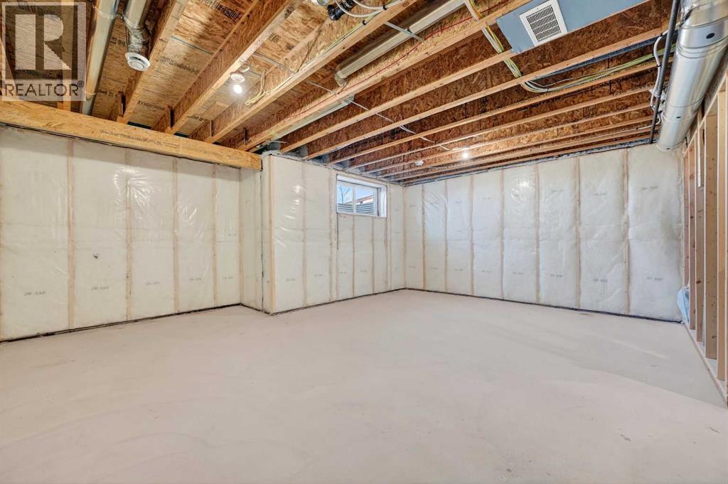 77 Belvedere Drive Se, Calgary, AB - Indoor Photo Showing Basement