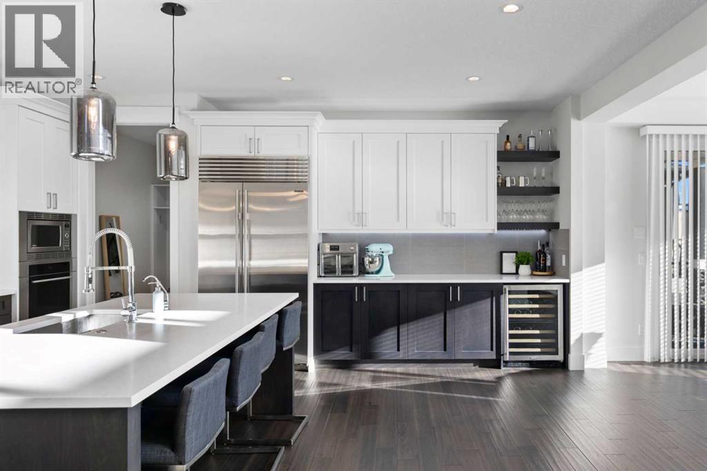 67 Aspen Vista Way Sw, Calgary, AB - Indoor Photo Showing Kitchen With Double Sink With Upgraded Kitchen