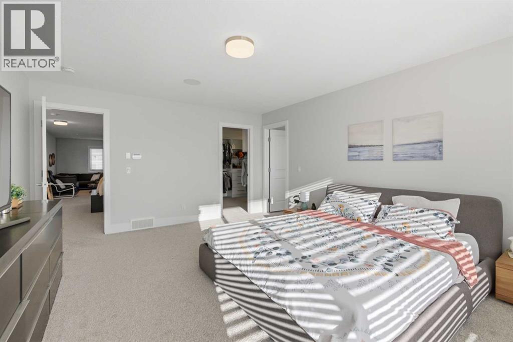 67 Aspen Vista Way Sw, Calgary, AB - Indoor Photo Showing Bedroom