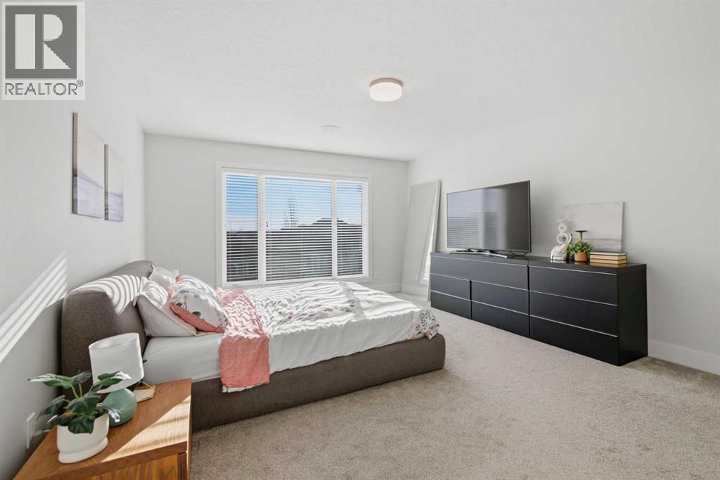 67 Aspen Vista Way Sw, Calgary, AB - Indoor Photo Showing Bedroom