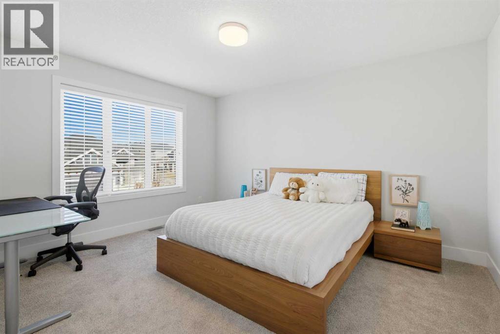 67 Aspen Vista Way Sw, Calgary, AB - Indoor Photo Showing Bedroom