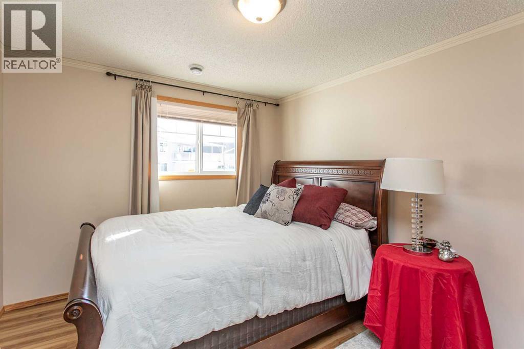409 Jenkins Drive, Red Deer, AB - Indoor Photo Showing Bedroom