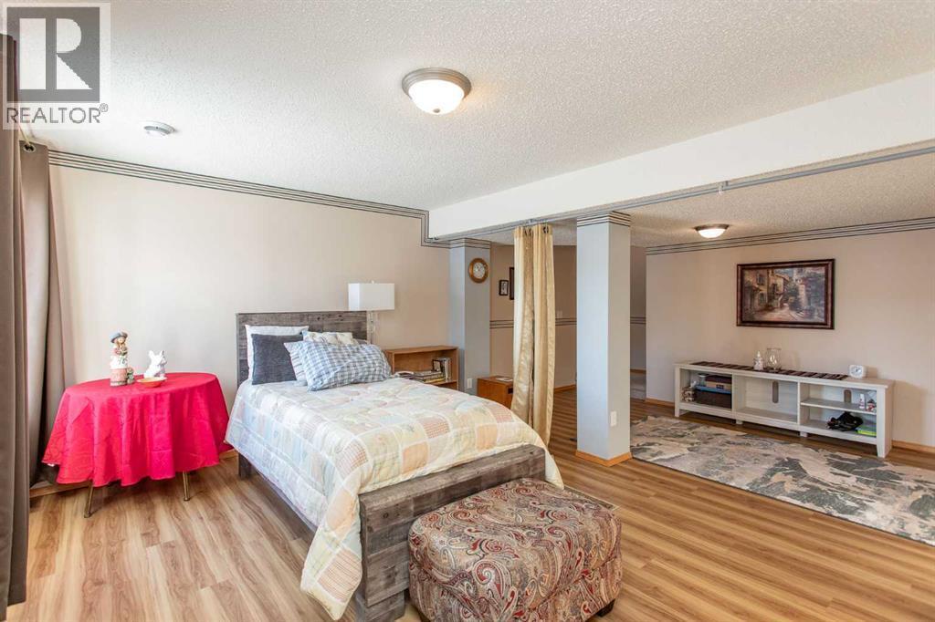 409 Jenkins Drive, Red Deer, AB - Indoor Photo Showing Bedroom