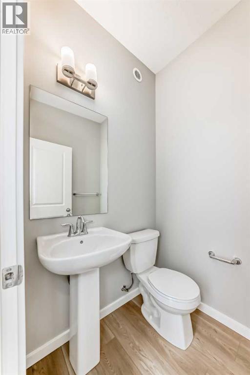 PLEASE NOTE: Photos are of a DIFFERENT Spec Home of the same model – fit and finish may differ. Interior selections and floorplans shown in photos - 85 Starling Boulevard Nw, Calgary, AB - Indoor Photo Showing Bathroom