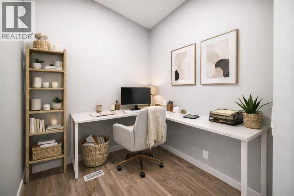 VIRTUALLY STAGED • PLEASE NOTE: Photos are of a DIFFERENT Spec Home of the same model – fit and finish may differ. Interior selections and floorplans shown in photos - 85 Starling Boulevard Nw, Calgary, AB - Indoor Photo Showing Office