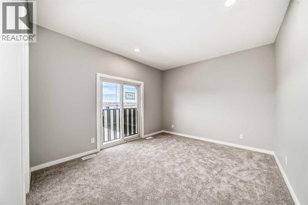 PLEASE NOTE: Photos are of a DIFFERENT Spec Home of the same model – fit and finish may differ. Interior selections and floorplans shown in photos - 85 Starling Boulevard Nw, Calgary, AB - Indoor Photo Showing Other Room
