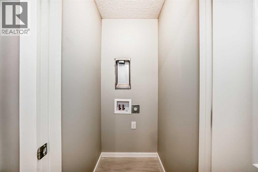 PLEASE NOTE: Photos are of a DIFFERENT Spec Home of the same model – fit and finish may differ. Interior selections and floorplans shown in photos - 85 Starling Boulevard Nw, Calgary, AB - Indoor Photo Showing Other Room