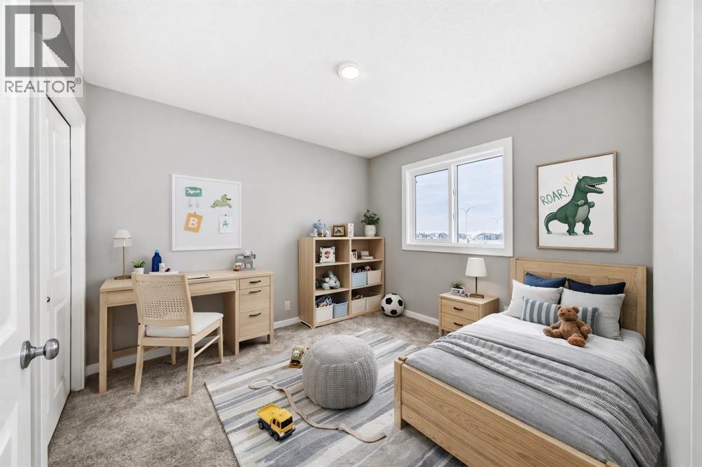 VIRTUALLY STAGED • PLEASE NOTE: Photos are of a DIFFERENT Spec Home of the same model – fit and finish may differ. Interior selections and floorplans shown in photos - 85 Starling Boulevard Nw, Calgary, AB - Indoor Photo Showing Bedroom