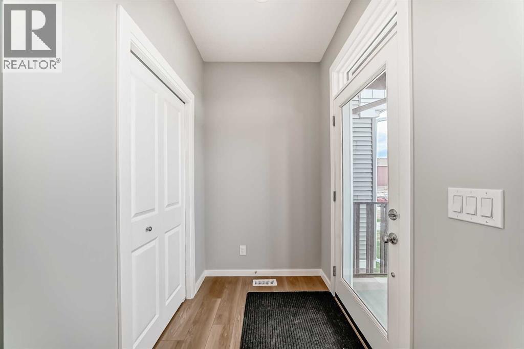 PLEASE NOTE: Photos are of a DIFFERENT Spec Home of the same model – fit and finish may differ. Interior selections and floorplans shown in photos - 85 Starling Boulevard Nw, Calgary, AB - Indoor Photo Showing Other Room