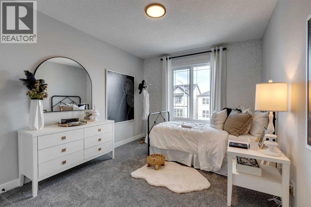 401 Sora Way Se, Calgary, AB - Indoor Photo Showing Bedroom