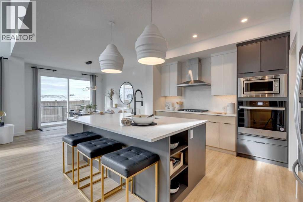 401 Sora Way Se, Calgary, AB - Indoor Photo Showing Kitchen With Stainless Steel Kitchen With Upgraded Kitchen