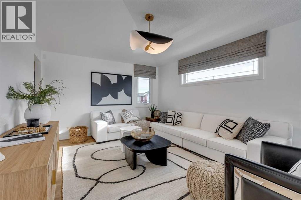 401 Sora Way Se, Calgary, AB - Indoor Photo Showing Living Room