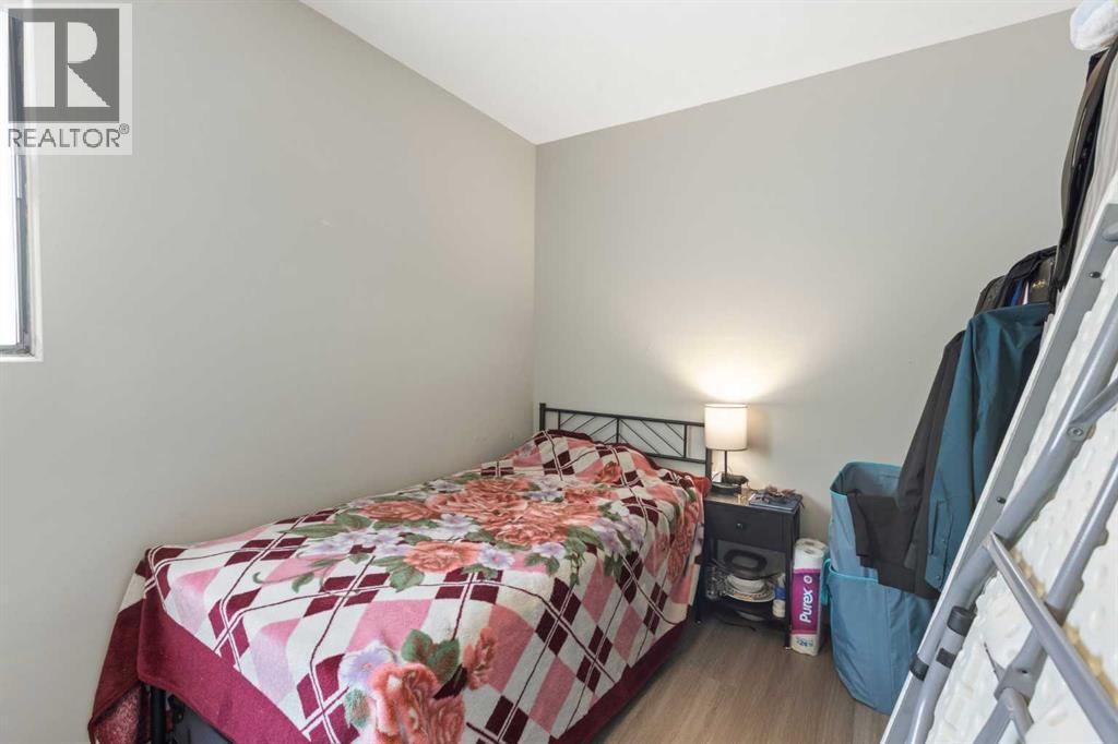 Bedroom #3 - 173 Gordon Drive Sw, Calgary, AB - Indoor Photo Showing Bedroom