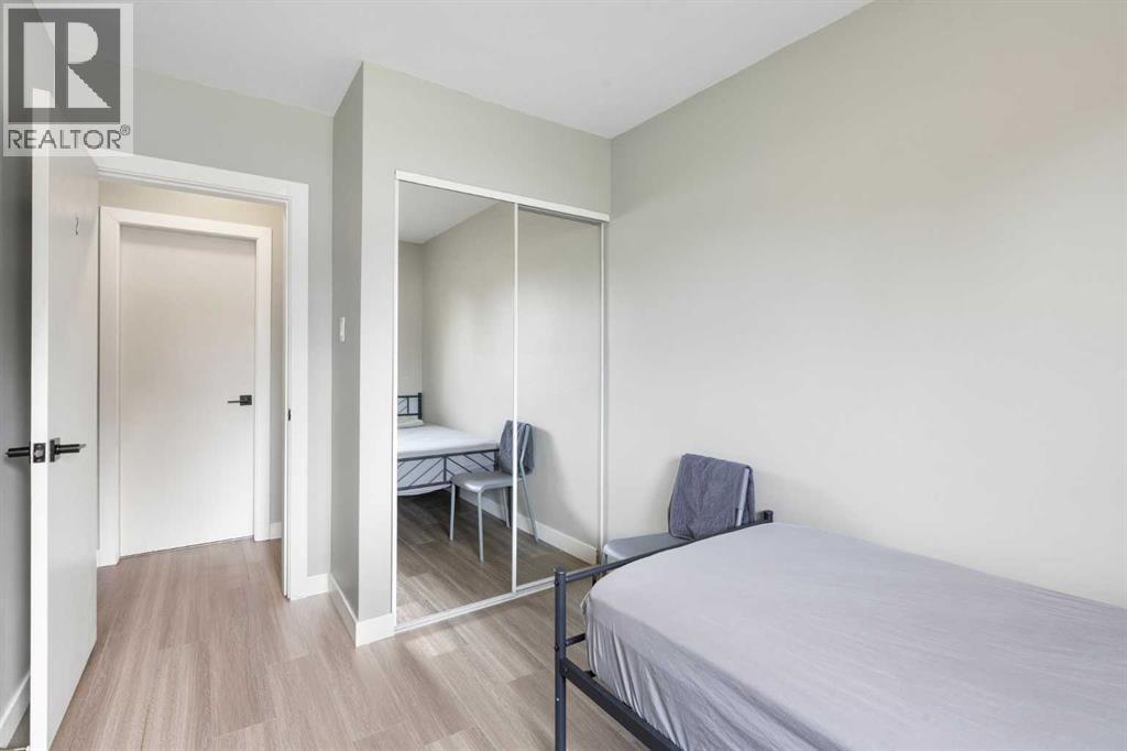 Bedroom #4 - 173 Gordon Drive Sw, Calgary, AB - Indoor Photo Showing Bedroom