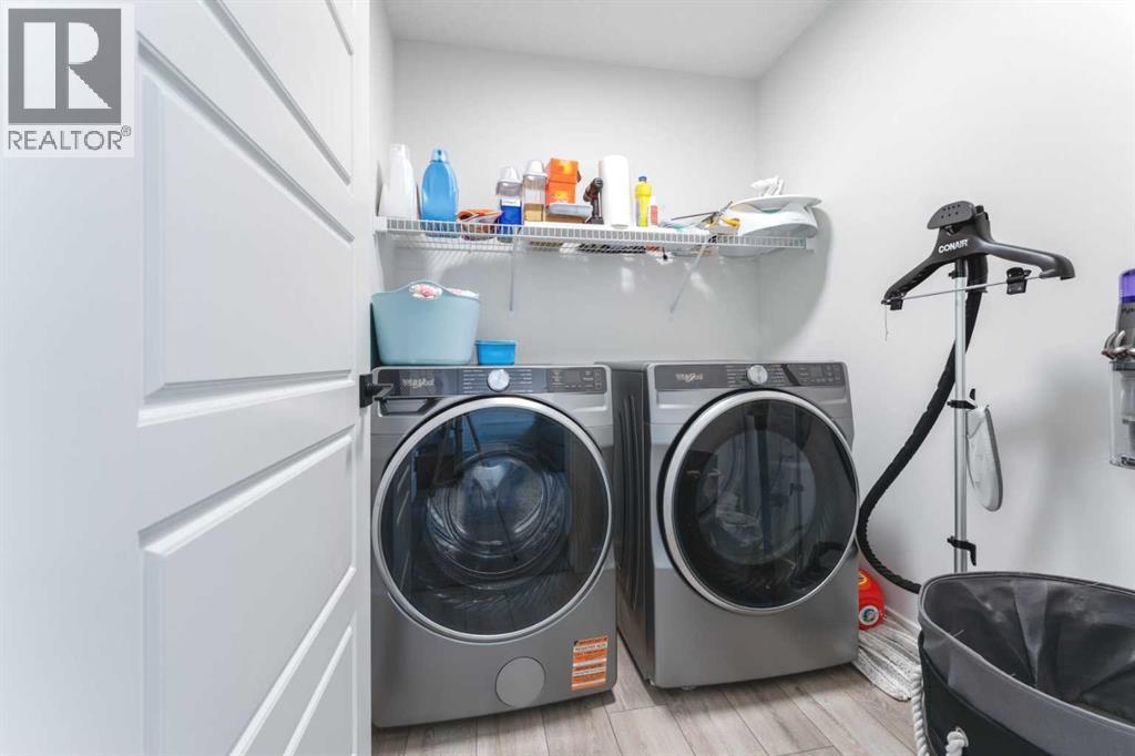 200 Lewiston Drive Ne, Calgary, AB - Indoor Photo Showing Laundry Room