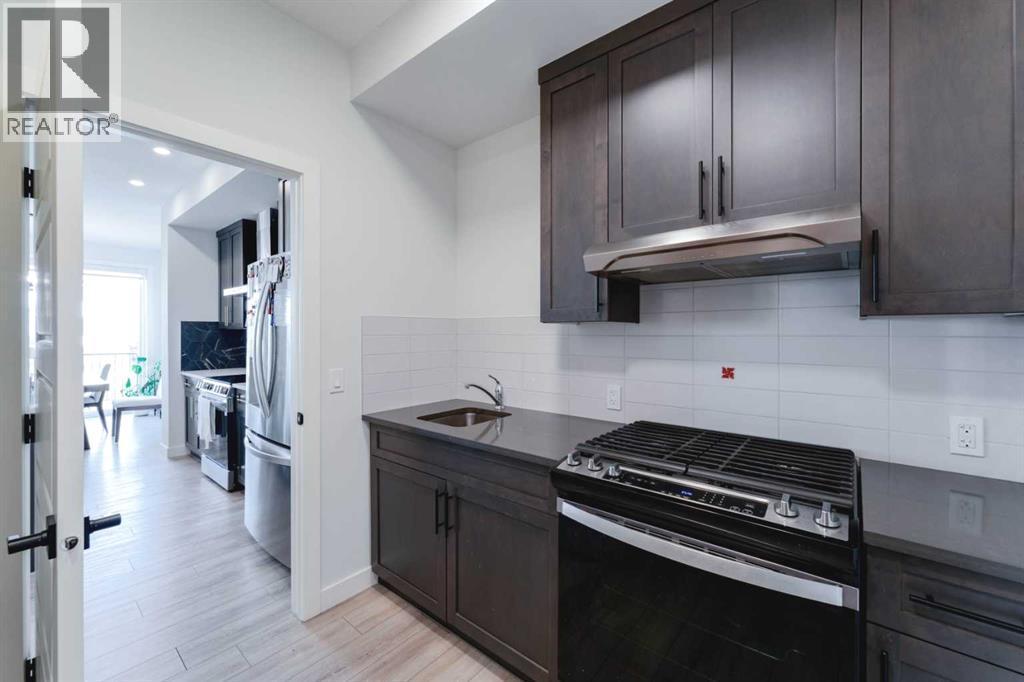 200 Lewiston Drive Ne, Calgary, AB - Indoor Photo Showing Kitchen With Upgraded Kitchen