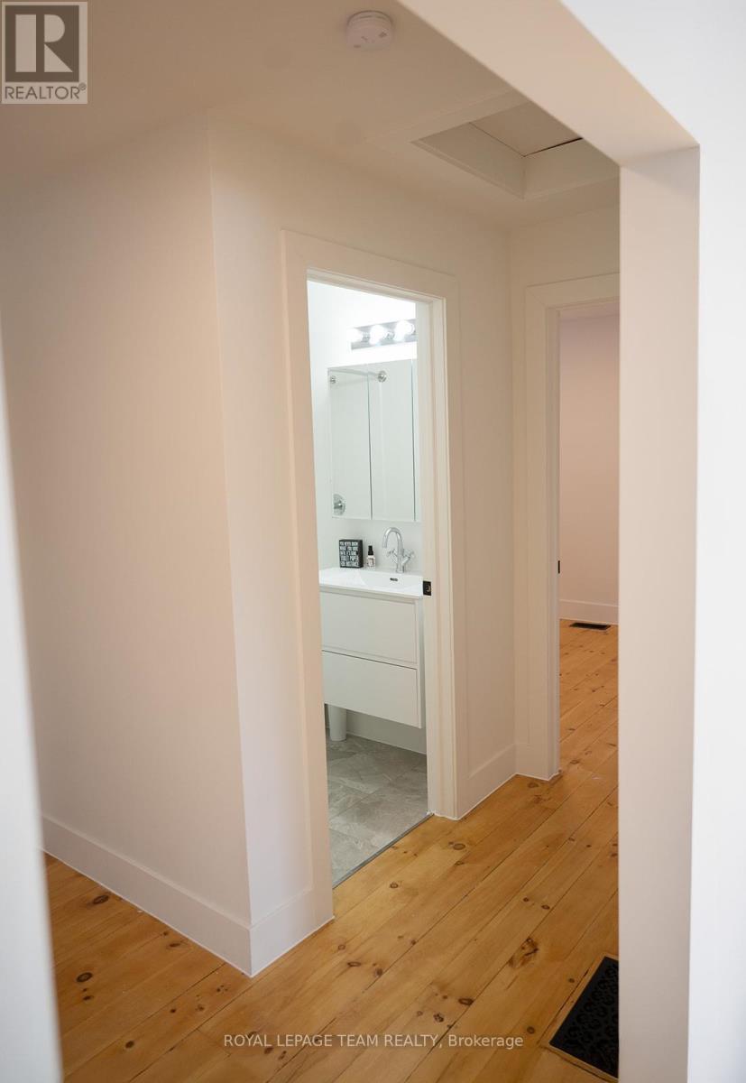 Hall leading to bath and bedroom 3 - 405 Barnes Street, North Grenville, ON - Indoor