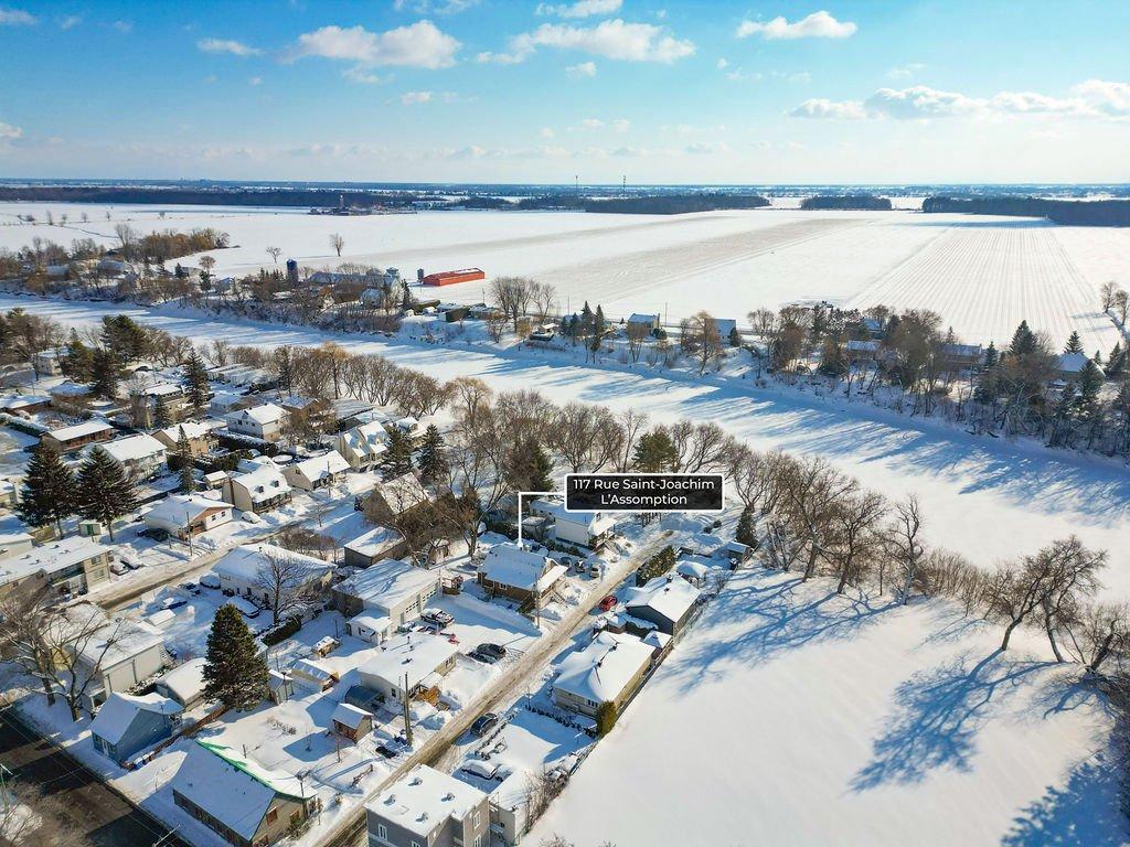 Aerial photo - 117 Rue St-Joachim, L'Assomption, QC - Outdoor With Body Of Water With View