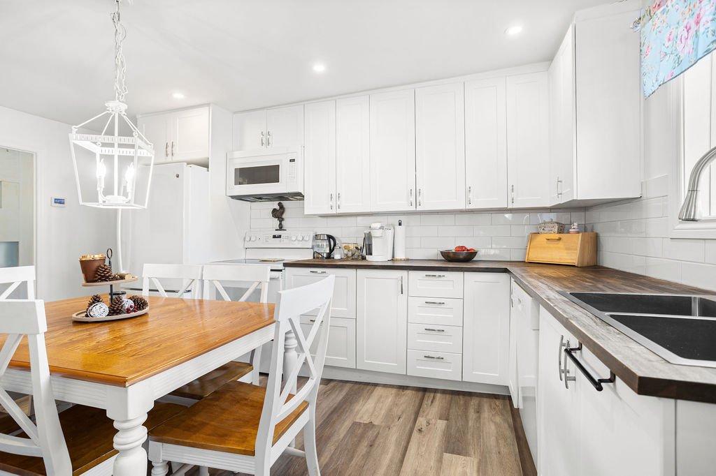 Kitchen - 117 Rue St-Joachim, L'Assomption, QC - Indoor Photo Showing Other Room