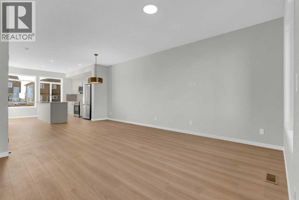 Living + Dining - 15 Corner Glen Drive Ne, Calgary, AB - Indoor Photo Showing Other Room