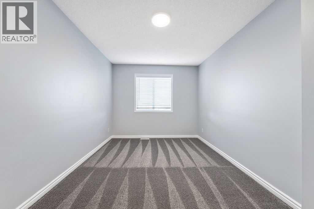 2nd Upper floor bedroom - 361 Cimarron Boulevard, Okotoks, AB - Indoor Photo Showing Other Room