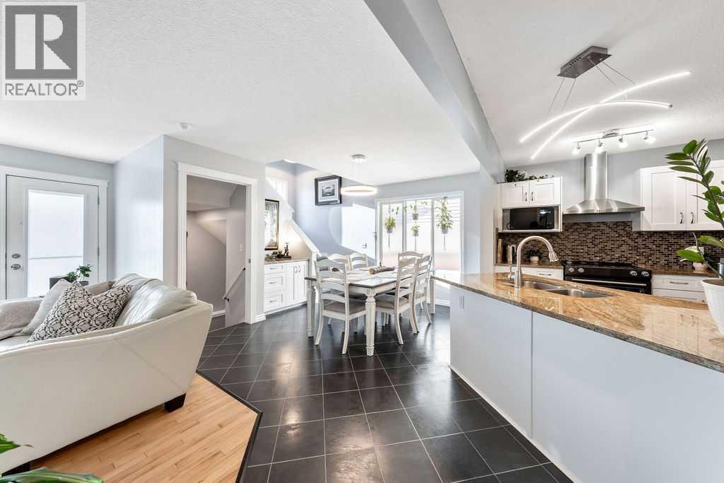 An airy open-concept layout ideal for everyday living and entertaining - 361 Cimarron Boulevard, Okotoks, AB - Indoor