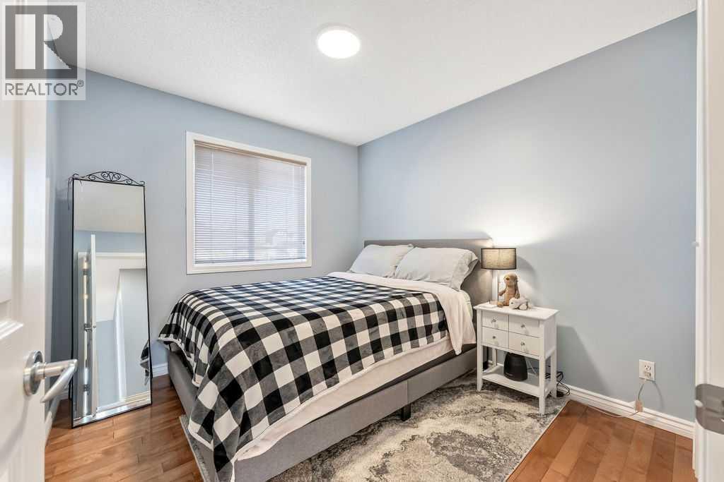 2nd Upper floor bedroom - 361 Cimarron Boulevard, Okotoks, AB - Indoor Photo Showing Bedroom