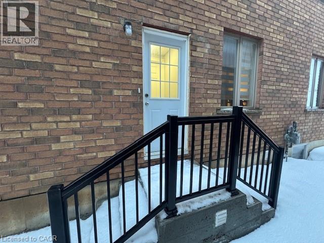 Property entrance with brick siding - 509 St Moritz Avenue Unit# Lower, Waterloo, ON - Outdoor With Exterior