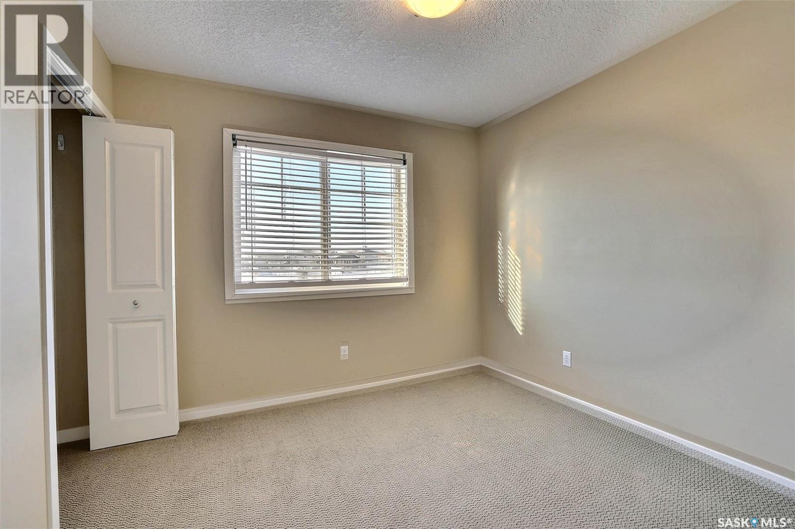 127 5059 James Hill Road, Regina, SK - Indoor Photo Showing Other Room