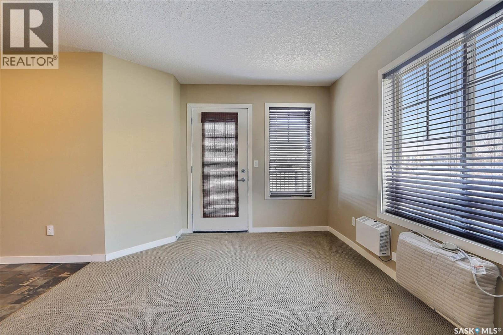 127 5059 James Hill Road, Regina, SK - Indoor Photo Showing Other Room