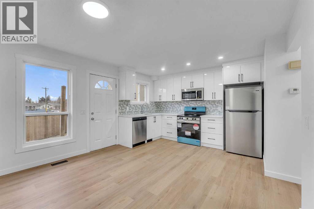 63 Penworth Close Se, Calgary, AB - Indoor Photo Showing Kitchen With Stainless Steel Kitchen