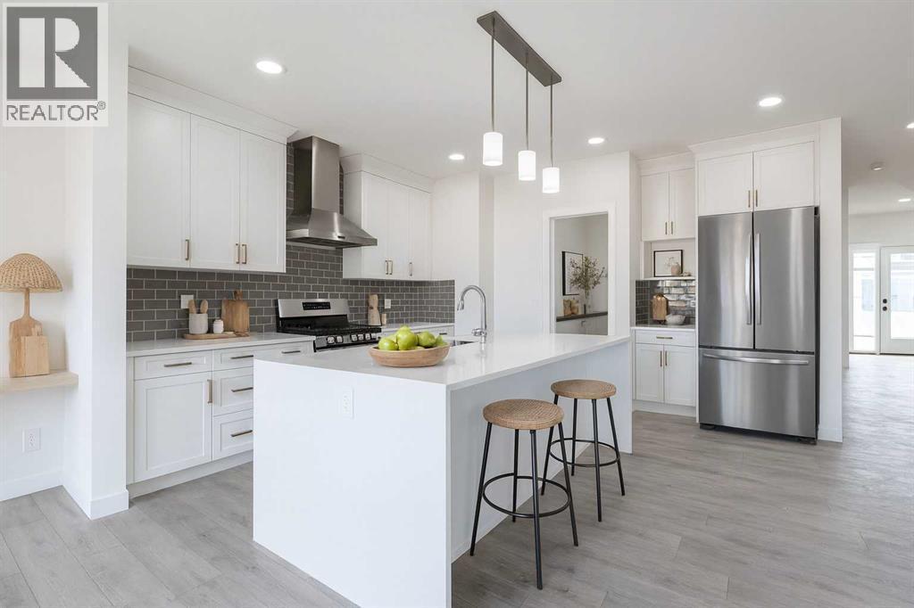 63 Amber View, Balzac, AB - Indoor Photo Showing Kitchen With Upgraded Kitchen