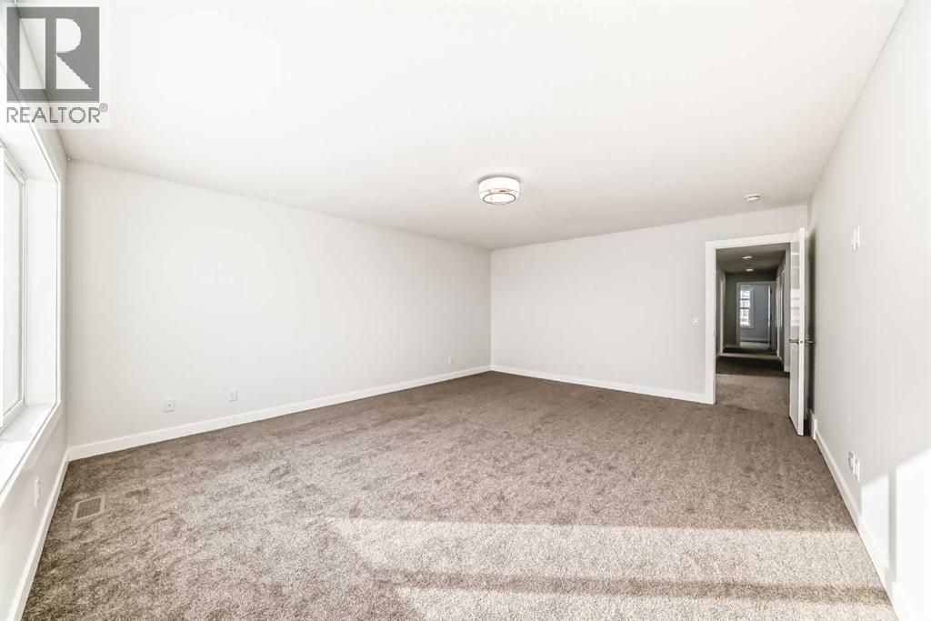 100 Corner Glen Manor Ne, Calgary, AB - Indoor Photo Showing Other Room
