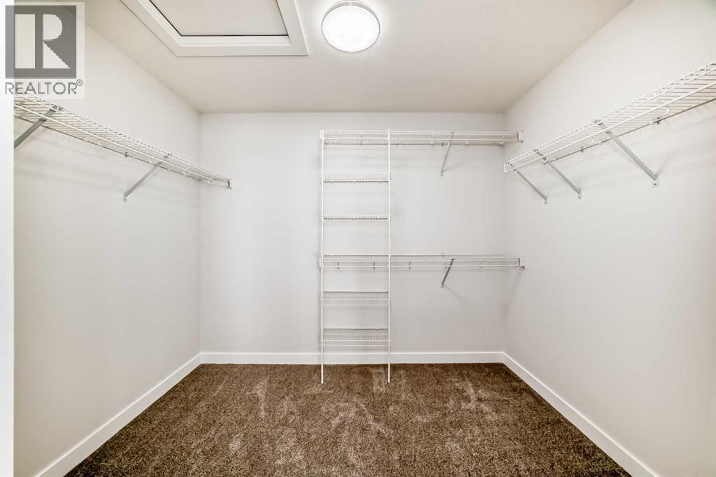 100 Corner Glen Manor Ne, Calgary, AB - Indoor With Storage