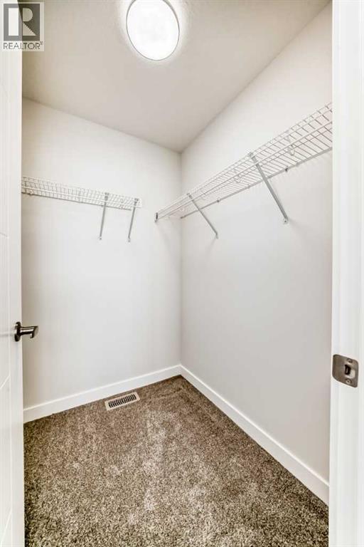 100 Corner Glen Manor Ne, Calgary, AB - Indoor With Storage
