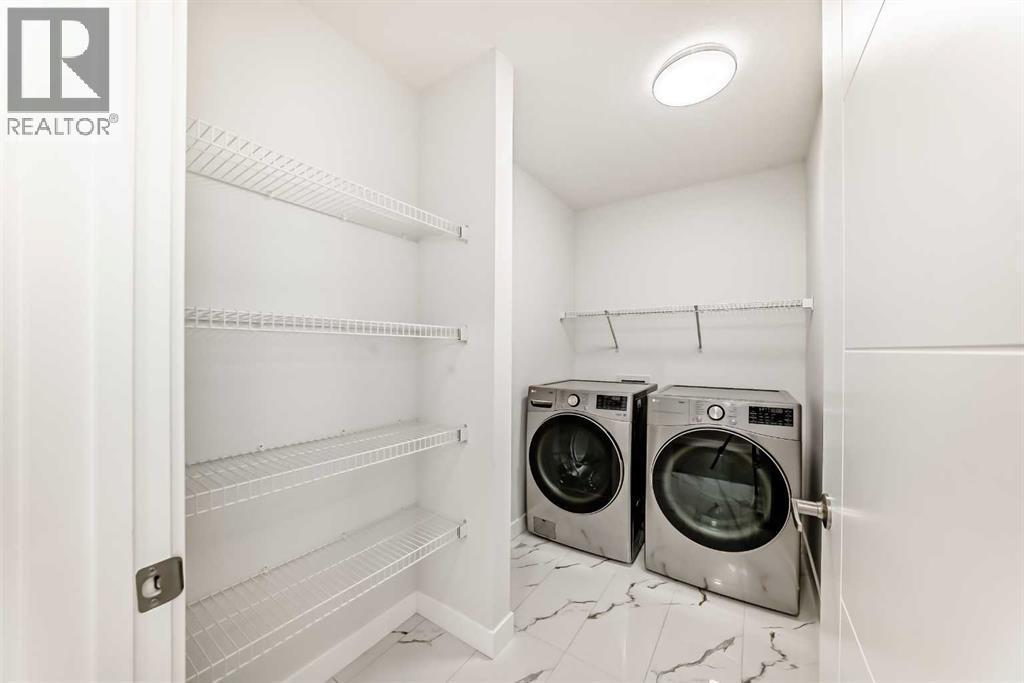 100 Corner Glen Manor Ne, Calgary, AB - Indoor Photo Showing Laundry Room