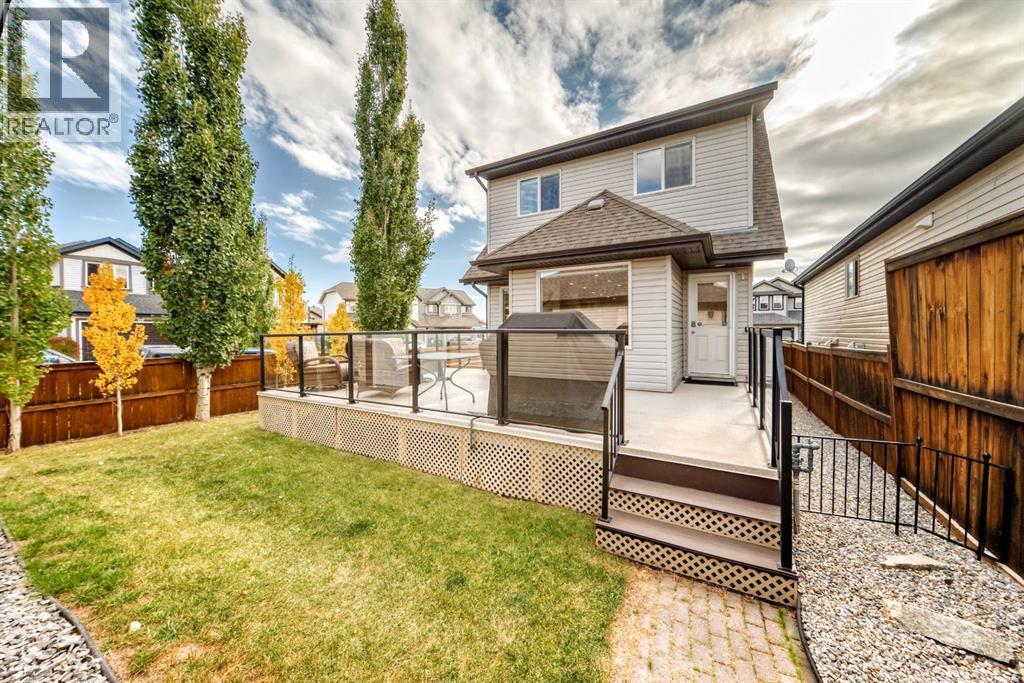 182 Sunset Heights, Cochrane, AB - Outdoor With Deck Patio Veranda