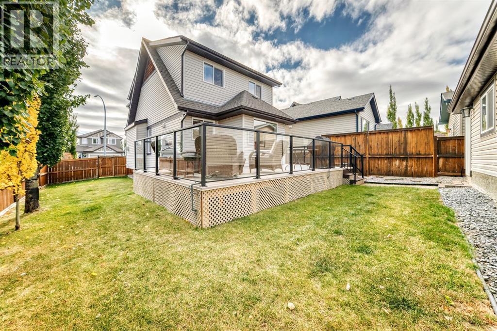 182 Sunset Heights, Cochrane, AB - Outdoor With Deck Patio Veranda With Exterior