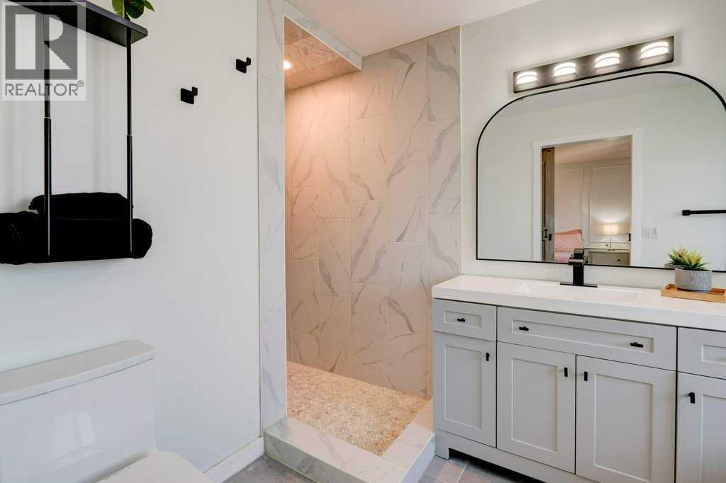 Custom built in shower - 15 Chaparral Crescent Se, Calgary, AB - Indoor Photo Showing Bathroom