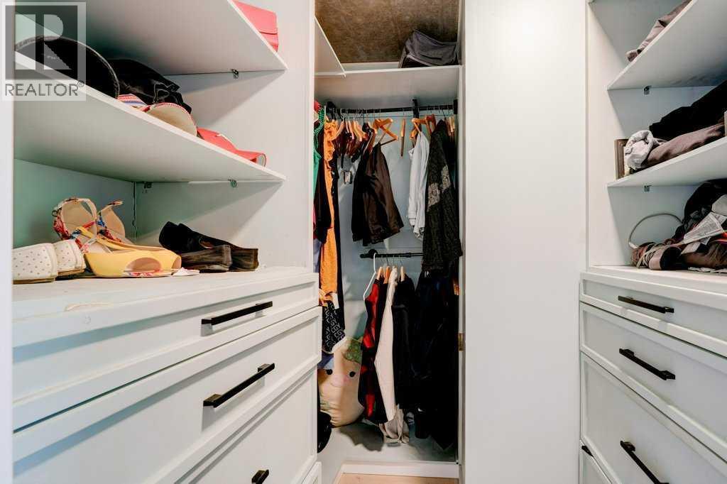 Custom walk-in closet - 15 Chaparral Crescent Se, Calgary, AB - Indoor