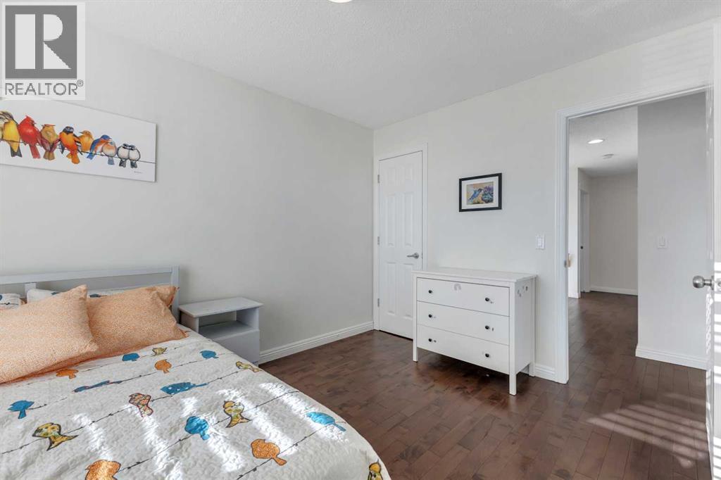 29 Sunset Close, Cochrane, AB - Indoor Photo Showing Bedroom