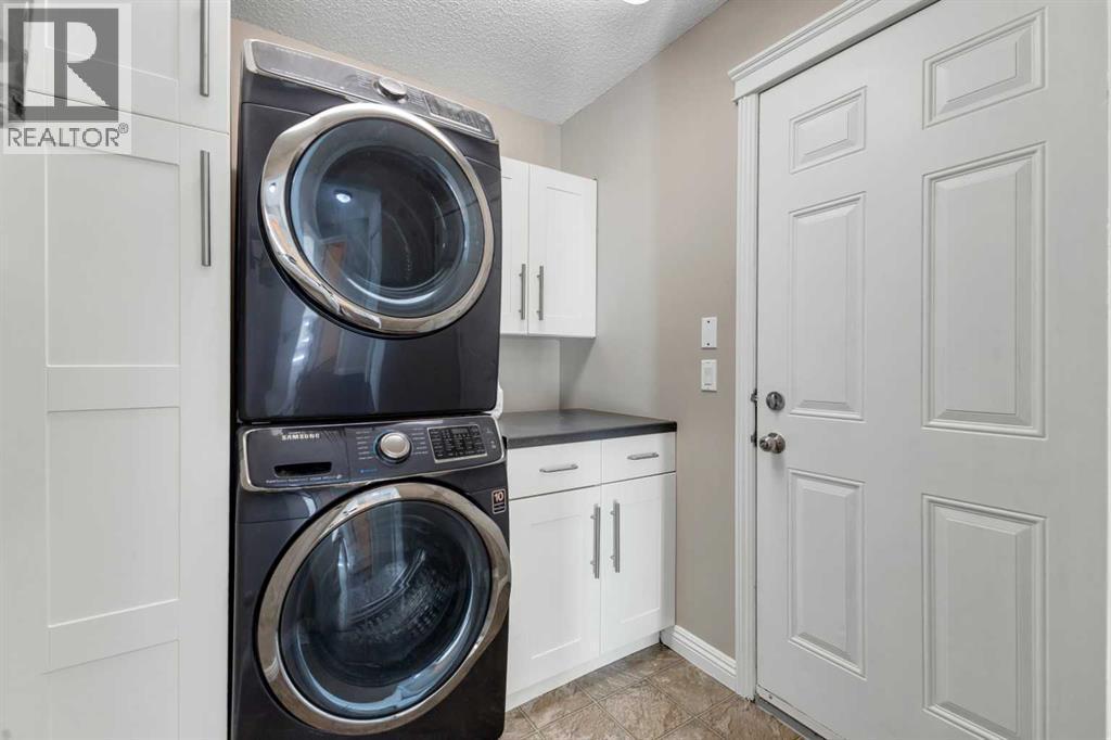 29 Sunset Close, Cochrane, AB - Indoor Photo Showing Laundry Room