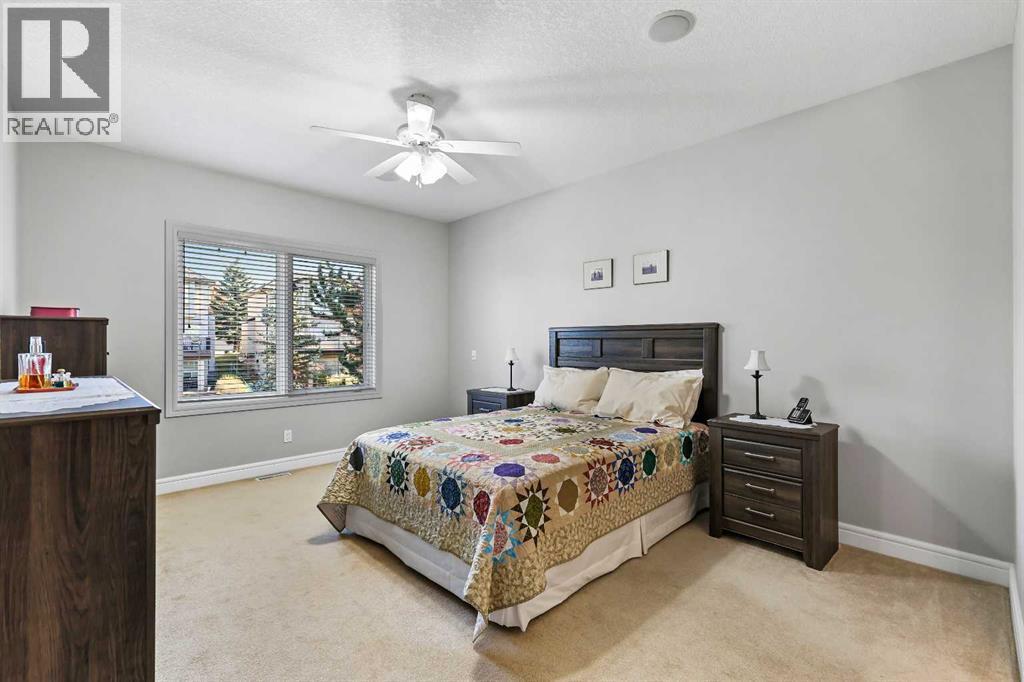 69 Evergreen Crescent Sw, Calgary, AB - Indoor Photo Showing Bedroom