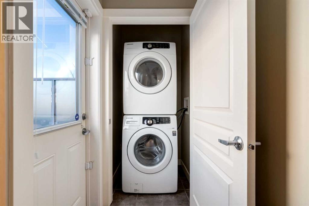 705 Evanston Square Nw, Calgary, AB - Indoor Photo Showing Laundry Room