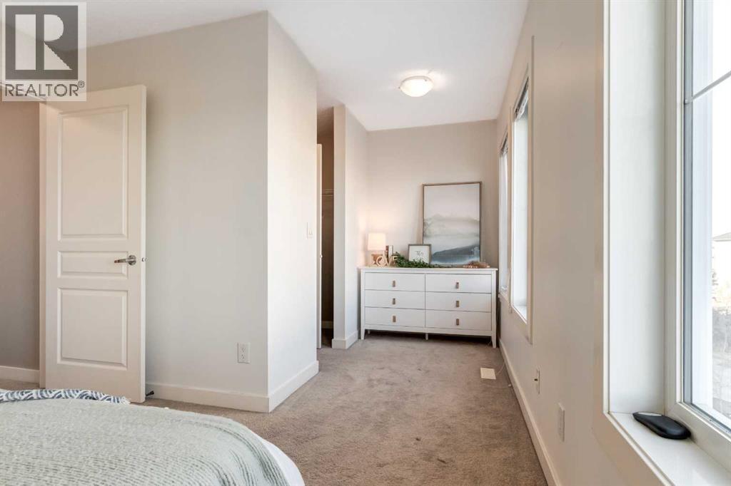 705 Evanston Square Nw, Calgary, AB - Indoor Photo Showing Bedroom