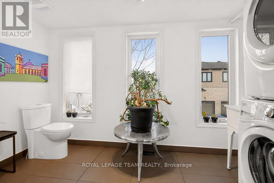 Laundry & powder room combo on 2nd floor - 787 Element Private, Ottawa, ON - Indoor Photo Showing Laundry Room