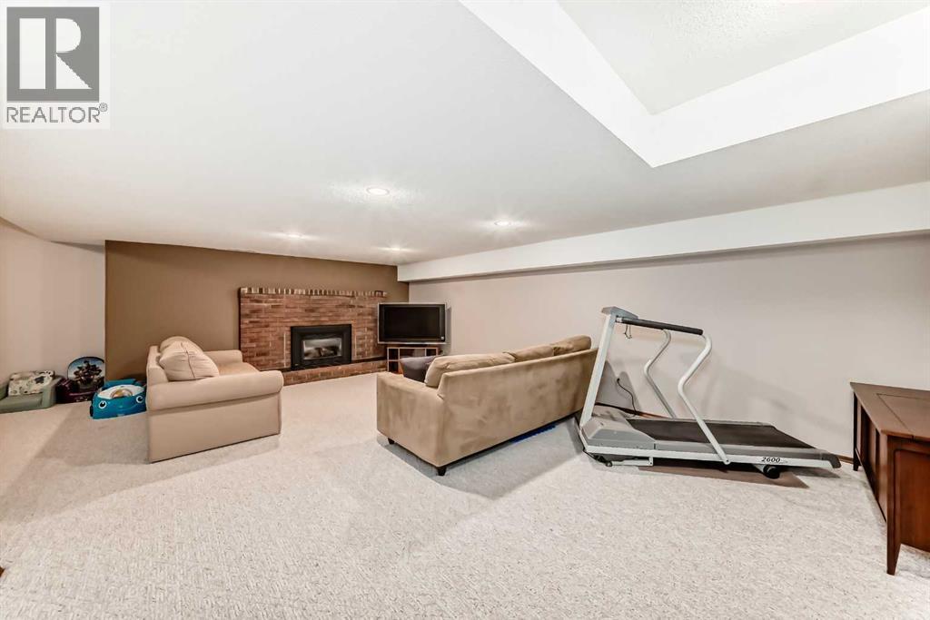 128 Dickenson Crescent, Red Deer, AB - Indoor With Fireplace