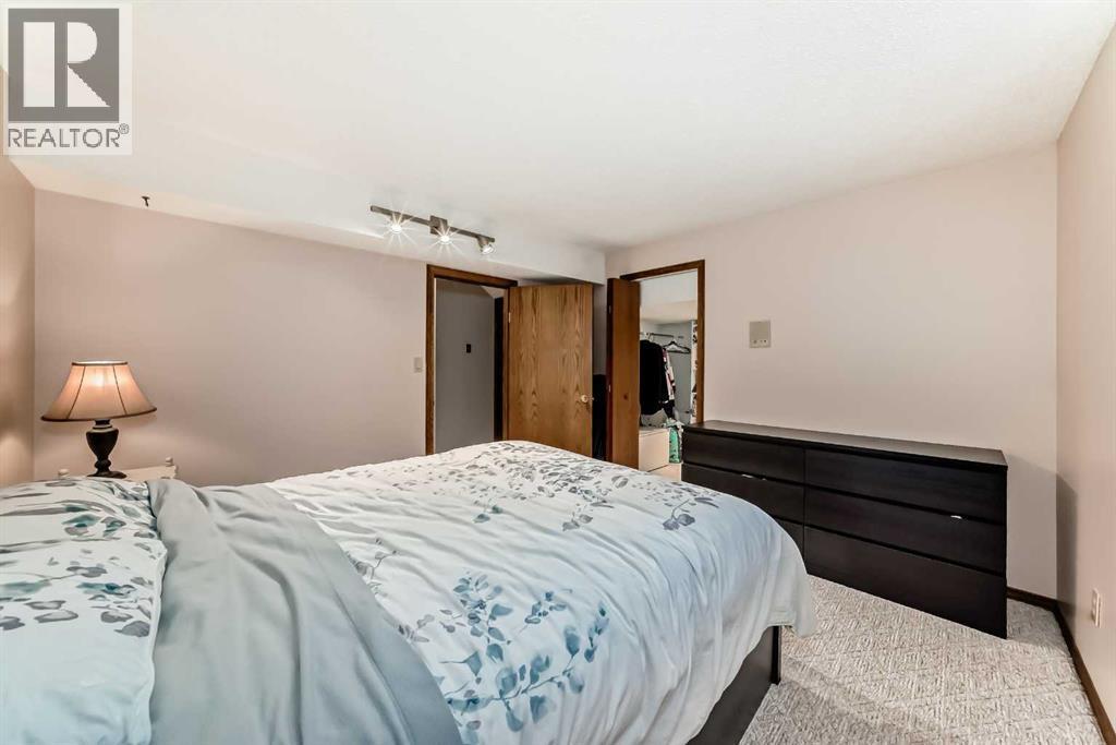 128 Dickenson Crescent, Red Deer, AB - Indoor Photo Showing Bedroom
